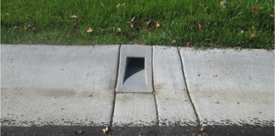 Curb Drain, Under the Sidewalk Drain, J Drain, Thru the Curb Drain, Through The Curb Drain, Rotomolded Curb Drain, Rotationally Molded Curb Drain