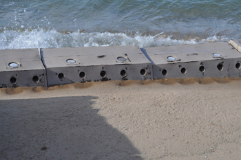 Sandsaver beach erosion barrier, sand saver, sandsavers installed, Installed Beach Erosion barrier