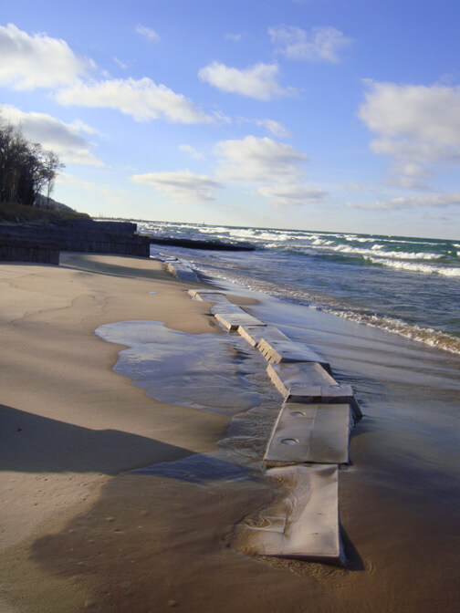 Sandsavers installed, sandgrabber, beach erosion barrier, beach renourishment device, beach barrier, beach erosion module, save beach barrier, Sandsaver, sand saver