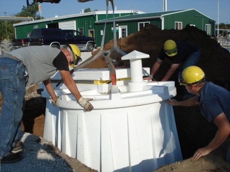 Installing a Granger ISS underground tornado shelter.