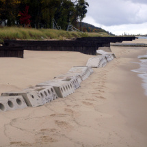 Sandsaver modules accreting sand on both sides of modules on Lake Michigan