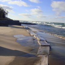 Sandsaver modules in Lake Michigan nearing completely covered